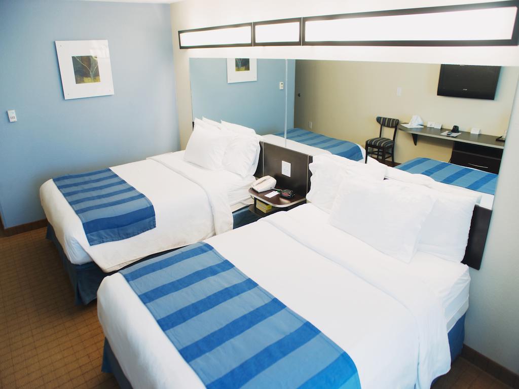 Three Rivers Inn & Suites Port Arthur Quarto foto